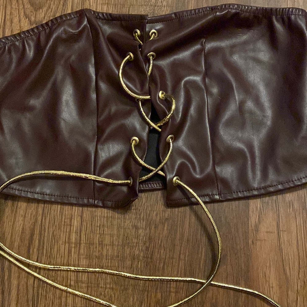 This is a tie up tube top that still has the tag on it